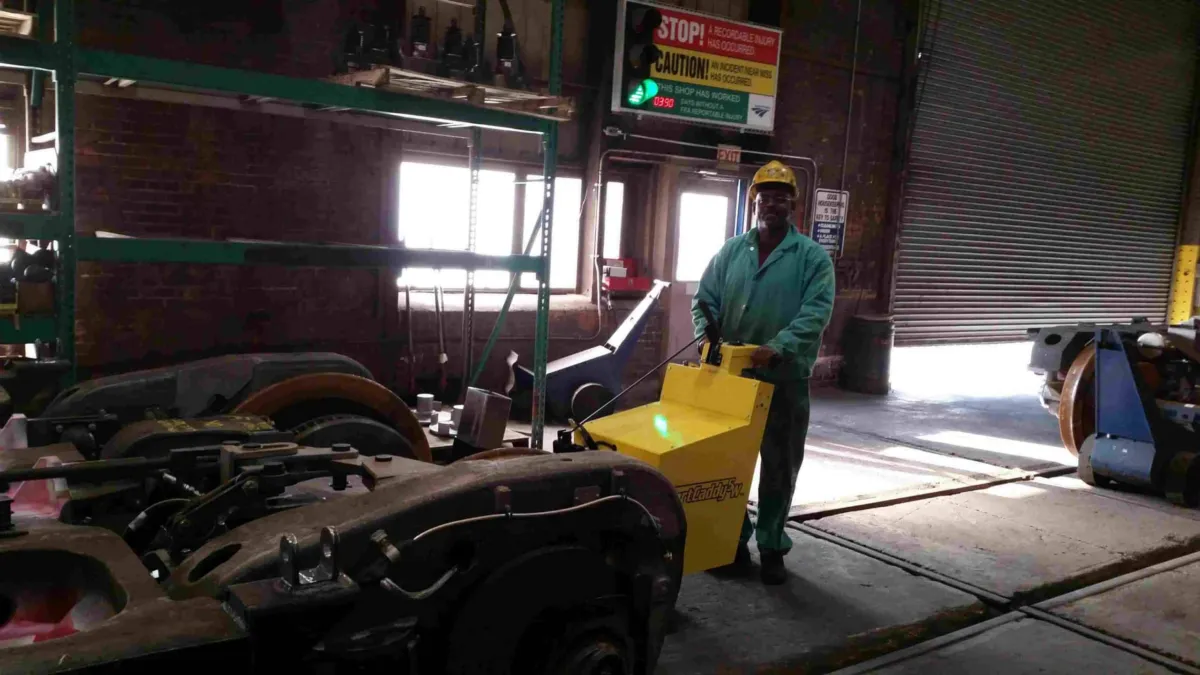 CartCaddy5W electric cart pusher in use