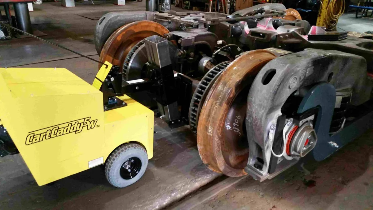 CartCaddy5W electric cart pusher in use