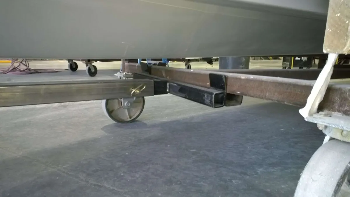 CartCaddy5W electric cart pusher in use